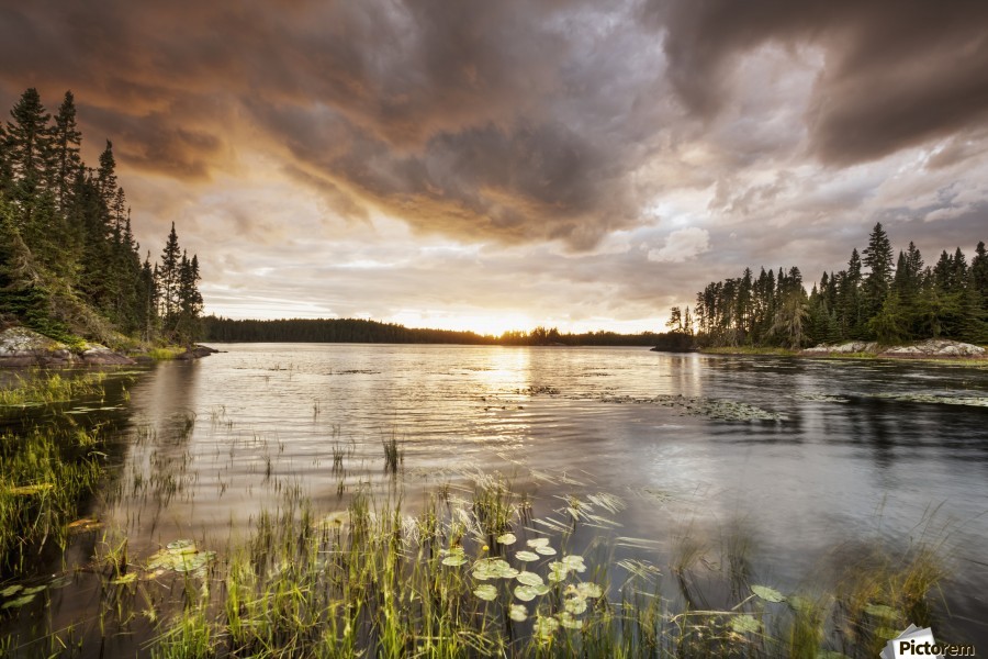 Sunset over a pond; Thunder Bay, Ontario, Canada - PacificStock