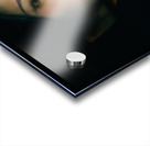 Young woman looking through a glass of water Acrylic print