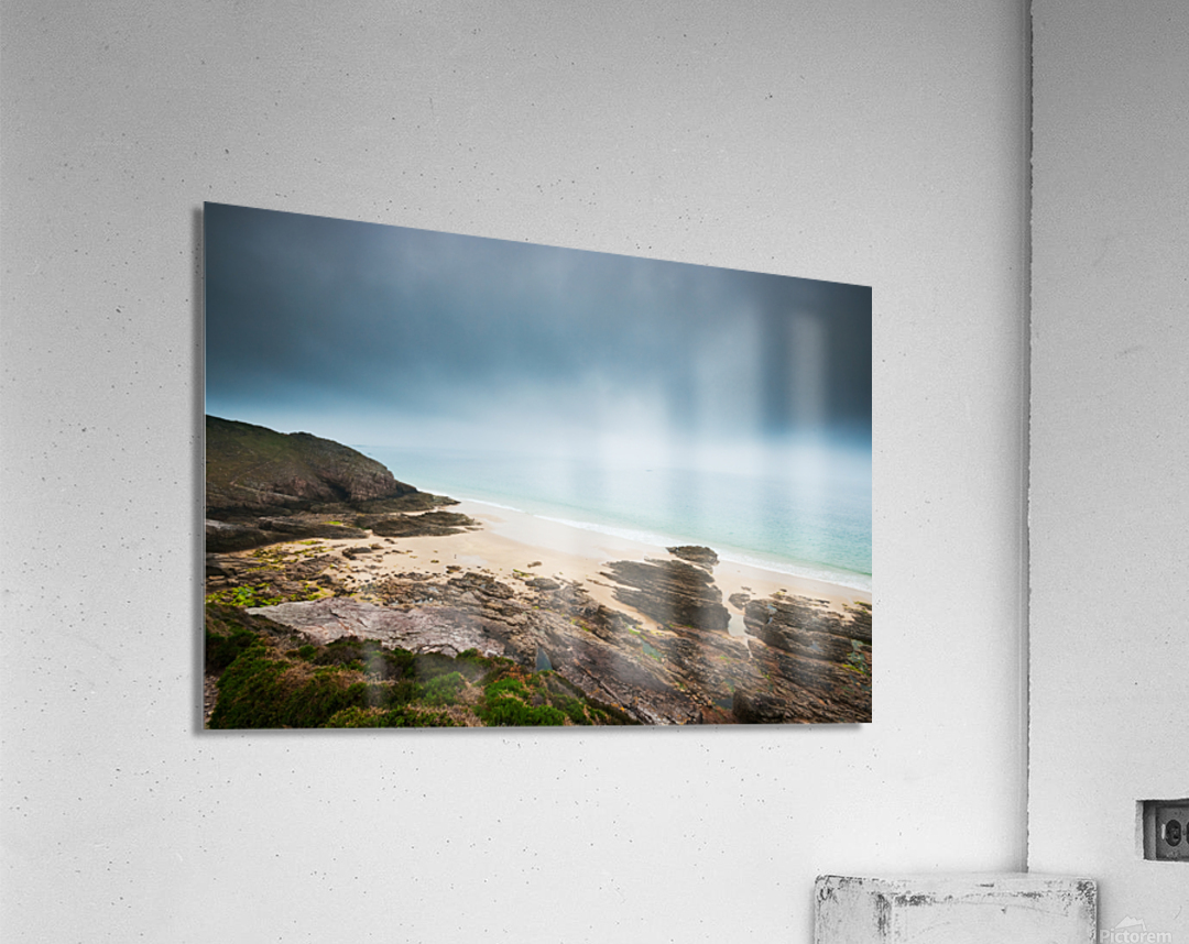 Beach with rocks and cloudy dark sky Acrylic Print