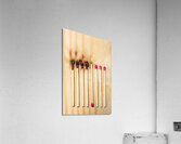 matches in a row some of which were lit and burnt Acrylic Print