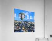 hot air balloons fly over the town Acrylic Print