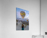 hot air balloon flies near the tourists . Acrylic Print