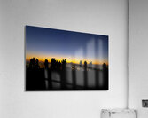Silhouetted figures observing sunset cityscape Acrylic Print