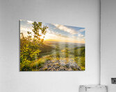 Beautiful sunset over a rock ledge Wackerstein in the Swabian Alps in Southern Germany Acrylic Print