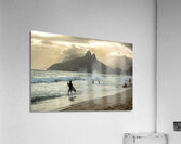 Surfer walking into the ocean at Ipanema Beach in Rio de Janeiro in Brazil at sunset Acrylic Print