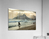 Surfer walking into the ocean at Ipanema Beach in Rio de Janeiro in Brazil at sunset Acrylic Print