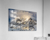 Sun rays shining through the clouds on a gorgeous morning at the Ortler Mountain in South Tyrol  Acrylic Print
