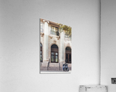 Blue scooters parked in front of an old building Acrylic Print
