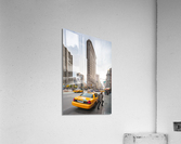 Young blonde woman getting out of a taxi in front of Flatiron building Acrylic Print