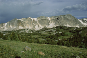 Quartzite cliffs and meadow near Libby Flats in Snowy Range of Wyoming E015