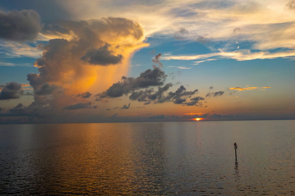 Sun Setting On the Tradewinds  by Hurricane Point Studios