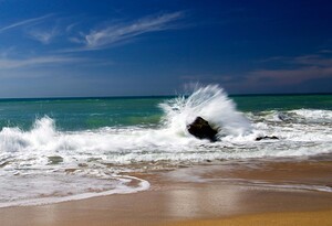Water Dancing with a Boulder