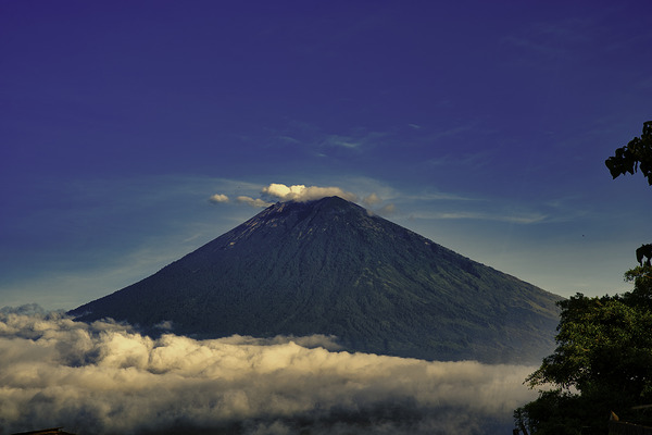 Mount Batur Rising Through the Clouds – Bali by AM Productions