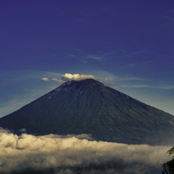 Mount Batur Rising Through the Clouds – Bali
