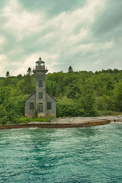 Upper Peninsula Lighthouse on the waters of Lake Michigan by Abellard Photography