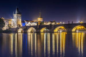Night impression of Charles Bridge with Old Town Bridge Tower