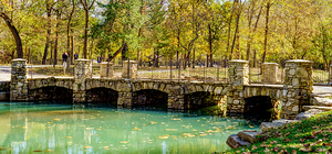 Autumn Over A Cobblestone Bridge