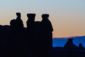 Three Gossips Silhouette Sunset