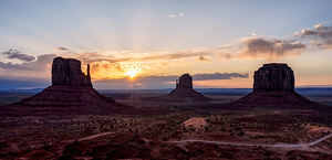 Sunrise Sunrays Over Monument Valley Pano