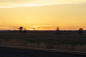 Colorado Farm And Train Tracks Sunset