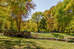 Golden Fall Foliage By The Bridge by Jennifer White
