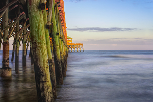 Beside Folly Beach Pier At Sunset