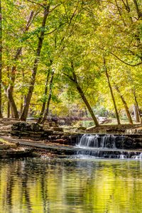 Waterfalls Cascading Over The Road Vertical
