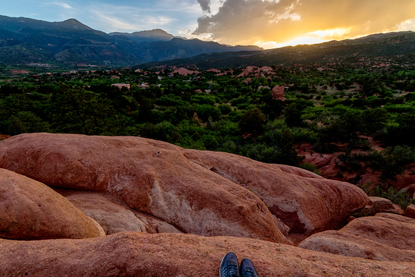 Feet On The Mountain Ledge At Sunset Print