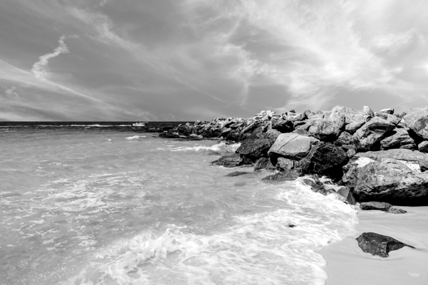 Waves Flow Along Shell Island Jetty Grayscale by Jennifer White