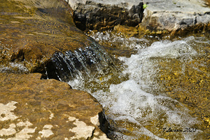  Huron River Ann Arbor Michigan. Running water over rocks.