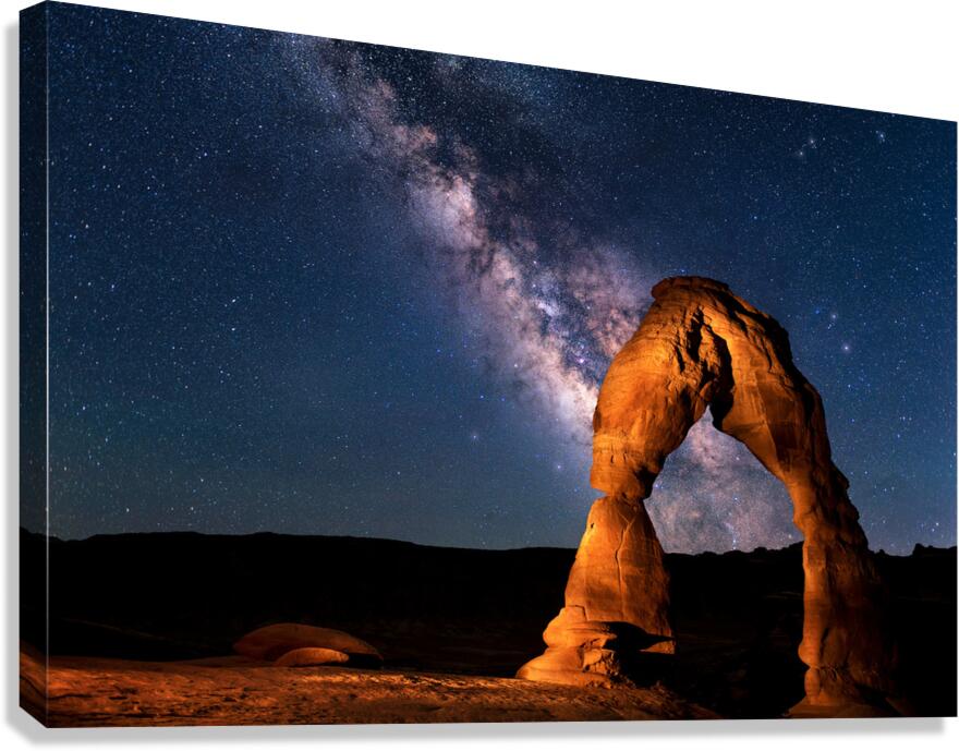 Delicate Arch Below the Solar System Canvas Print