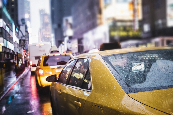 Taxi cab in the rain in NYC by simowave