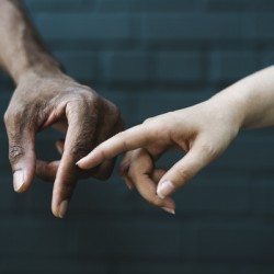 Hands touching together