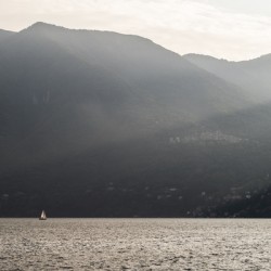 Boat in the middle of Lake Como Italy 