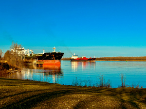 Two cargo on the river by Genevieve Gagnon