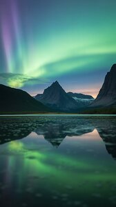 a photograph of a serene mountain landsc 17Z88yDa