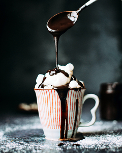 Delicious Ice Cream With Chocolate Syrup Topping