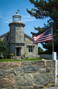 American Flag By Stonington Harbor Lighthouse in Connecticut