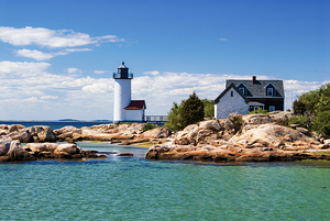 Annisquam Harbor Lighthouse Among Shoreline Rocks in Massachusetts