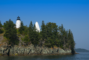 Eagle Island Light and Fog Tower Over Rocky Cliffs in Maine