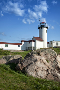 Boulder Shaped Like Wave in Front of Eastern Point Lighthouse in Massachusetts