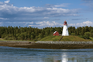 Mulholland Lighthouse on Hilltop During Low Tide in Canada