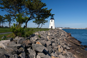 Stone Breakwater Surrounds Newport Harbor Lighthouse in Rhode Island
