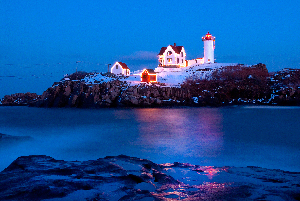 Lighted Cape Neddick Nubble Lighthouse During the Holidays in Maine