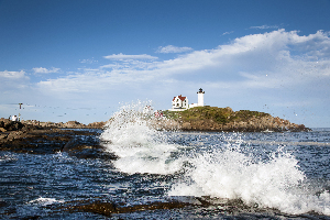 Surf Crashing by Cape Neddick Nubble Lighthouse in Maine