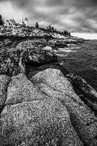 Pemaquid Lighthouse Sits Above Unique Rock Formations in Mid Coast Maine - B&W