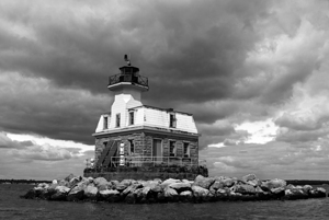 Haunted Penfield Reef Lighthouse Under Clearing Stormy Skies in Connecticut -B&W