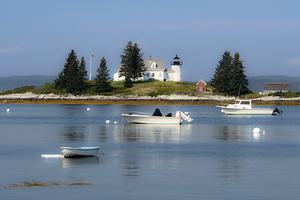 Boats Moored Around Pumpkin Island Lighthouse on a Hazy Day in Maine