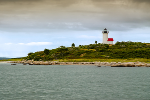Storm Clouds Clearing Over Tarpaulin Cove Light in Massachusetts
