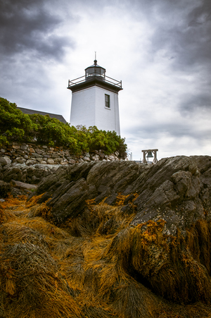 Grindle Point Light Tower Under Cloudy Skies at Islesboro Island During Low Tide in Maine